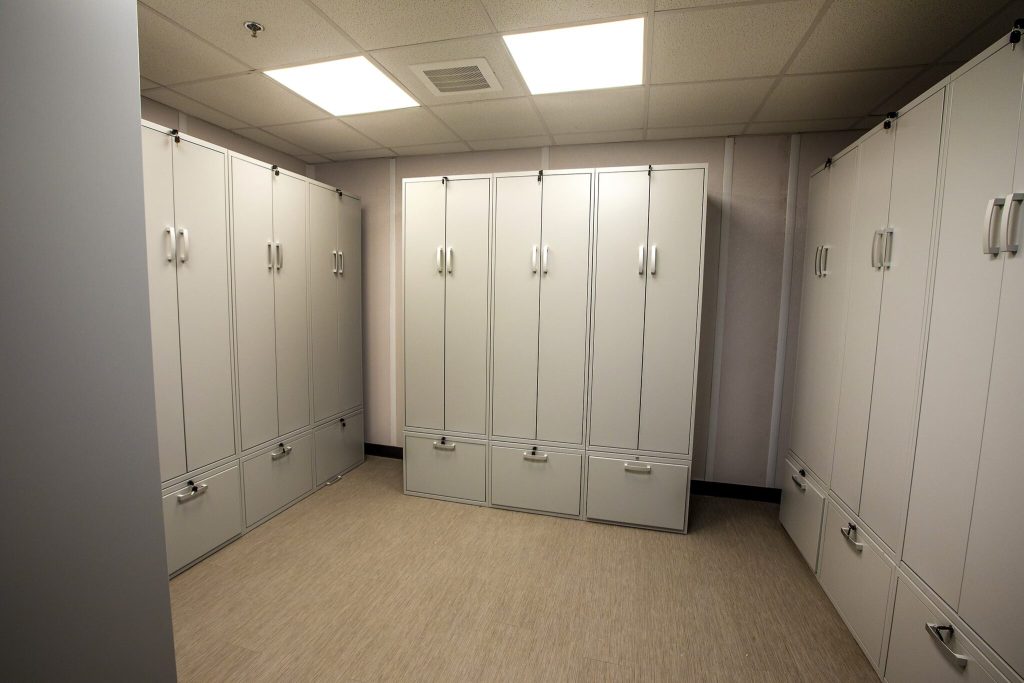 Interior view of a triumph modular building featuring multiple storage units, showcasing the efficient design of modular construction for various applications.