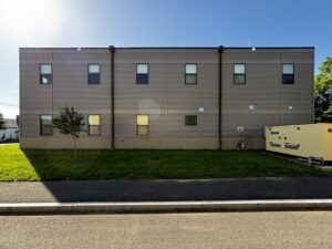 Side view of two story fire station living quarters