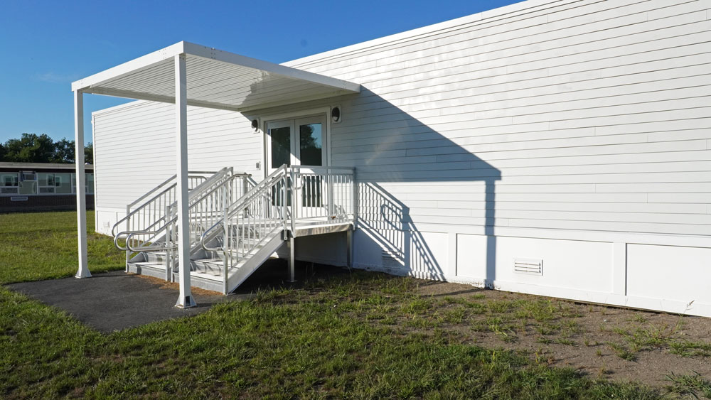 modular classroom entrance to playground
