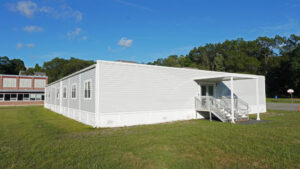 permanent modular classroom next to school basketball court