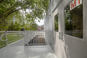 Side view of Silverline classroom with ramp and trees