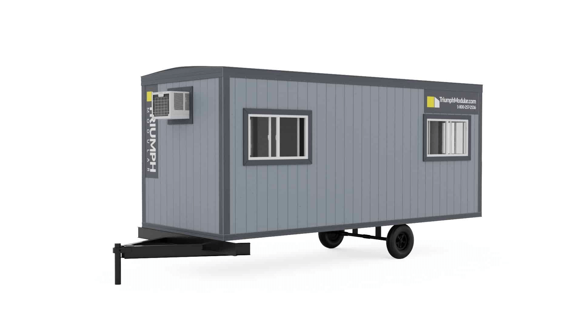 Triumph Modular Building portable grey modular unit on wheels with multiple windows, designed for versatile use in various settings.
