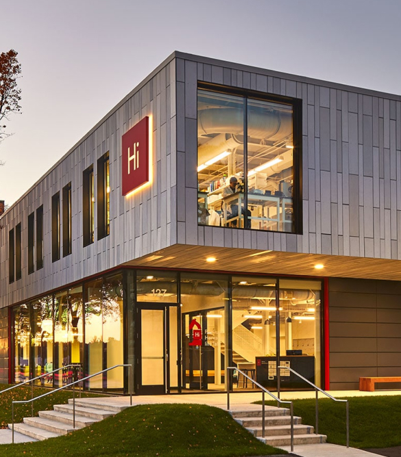 Modern permanent modular building featuring large windows and contemporary design, showcasing the benefits of modular construction.